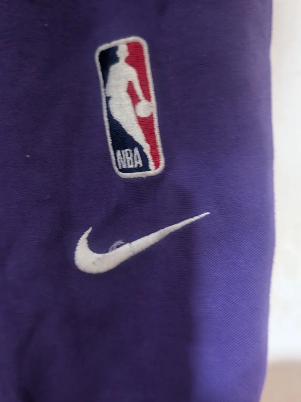 Nike sweatpants stitched